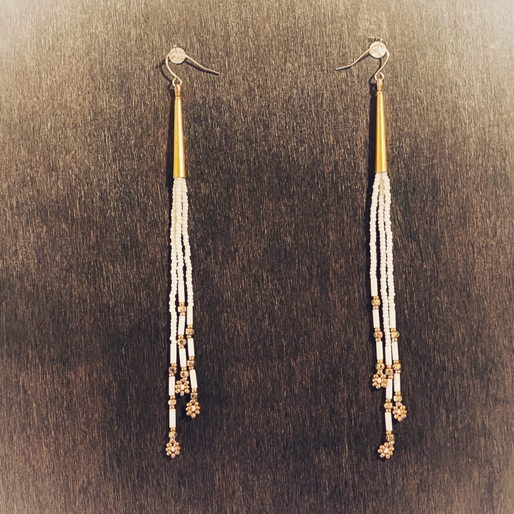 Cream and gold dangle earrings